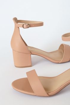 Dress up your casual jeans or complement a cocktail dress with the ever-versatile Lulus Harper Almond Ankle Strap Heels! Smooth, nude faux leather creates a slender toe strap and a single sole silhouette. An essential mid-low block heel provides a comfortable lift and rests below a sturdy heel cup and an adjustable ankle strap with a gold buckle. 2. 5" wrapped block heel. Cushioned insole. Nonskid rubber sole. Upper Material: Synthetic. Sole Material: TPR. Imported. Lulus | Harper Almond Ankle S Trendy Beige Sandals For Night Out, Elegant Beige Faux Leather Sandals, Beige Heels For Night Out In Spring, Beige Ankle Strap Heels In Faux Leather, Beige Ankle Strap Heels For Date Night, Beige Sandals With Heel Strap For Night Out, Beige Faux Leather Heels For Summer, Beige Heels For Spring Date Night, Beige Heels For Date Night In Spring