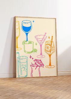 a painting on the wall next to a chair and vase with a drink in it