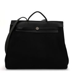 This is an authentic HERMES Toile Vache Calfskin Herbag 39 MM in Black. This stylish bag is crafted of black toile canvas. The bag features a black leather crest with leather top handles, a shoulder strap, and polished palladium plated hardware. The opens to a black fabric interior with a removable pouch. Designer Top Handle Canvas Bag For Travel, Designer Canvas Travel Bag With Top Handle, Designer Travel Canvas Bag With Top Handle, Designer Canvas Bag With Detachable Handle For Travel, Designer Canvas Satchel Bag For Travel, Luxury Canvas Bag With Top Handle, Luxury Black Rectangular Canvas Bag, Luxury Canvas Tote Bag With Detachable Handle, Luxury Black Canvas Bag With Leather Handles