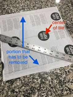 a pair of rulers on top of a newspaper with the words portion that has to be removed