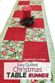 an easy quilted christmas table runner with a red candle on it and the words easy quilt