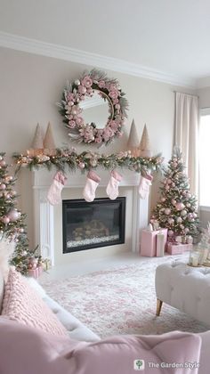 a living room decorated for christmas with pink decorations