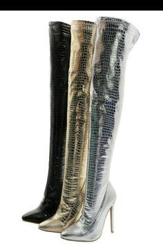 Silver Metallic Over The Knee High Heel Pointed Toe Thigh High Crocodile skin Boots We think that these high heel boots are a great choice if you want the party look and the glamour without going too wild. The style is so elegant and simple, but perfect for a formal event, or to wear on a night out with your friends. The color is something that we need to mention when it comes to these knee high heel boots because it's not just a shiny metallic silver but has a crocodile skin hue to it, which re Glamorous Winter Platform Boots, Luxury Knee-high Boots For Party, Luxury Knee-high Boots For Winter Party, Glamorous Platform Boots For Fall Party, Glamorous Fall Party Platform Boots, Glamorous Pointed Toe Knee-high Boots For Party, Glamorous Pointed Toe Knee-high Boots For Night Out, Glamorous High Heel Knee-high Boots For Night Out, Glamorous Knee-high Boots With Pointed Toe For Party