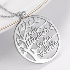 Christmas is coming, don't know what gifts for family and lover?There are a plethora of gorgeous designs that can be customized with a name, two names, or even inspirational words that you love. Name Necklace Official provides affordable engravable jewelry that won't break the bank. In addition, these pieces make for very thoughtful and appreciated gifts for friends and family. Give them to someone celebrating a birthday, graduation, baby shower, or anniversary. The finishes are beautifully poli Tree Name, Portrait Necklace, Custom Family Tree, Picture Necklace, Family Tree Necklace, Family Necklace, Circle Pendant Necklace, Tree Of Life Necklace, Tree Necklace