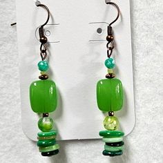 J109 Handmade Beaded Green, Bronze Dangle Earrings Brand New Design! This Is A Listing For A Live Show. Please Watch The Live Show For More Information. Czech Glass Beaded Earrings With Dangling Beads, Jade Beaded Earrings For Jewelry Making, Adjustable Jade Beaded Dangle Earrings, Dangle Czech Glass Beaded Earrings, Dangle Beaded Earrings With Czech Glass, Green Dangle Jewelry With Large Beads, Jade Beaded Drop Earrings, Green Czech Glass Dangle Beaded Earrings, Adjustable Green Beaded Earrings With Large Beads