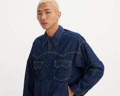 We took our iconic Trucker Jacket and gave it a Western upgrade. With a casual, relaxed cut, this Western Trucker Jacket features a classic button-up front, pointed flap pockets and defined yoke detailing. A western-inspired Trucker Jacket Cut with a relaxed fit Finished with pointed flap pockets and defined yoke detailing Classic Long Sleeve Outerwear For Rodeo, Western Style Long Sleeve Workwear Outerwear, Western Style Workwear Outerwear, Western Style Long Sleeve Outerwear For Work, Western Style Outerwear With Button Closure For Work, Classic Fall Outerwear For Rodeo, Western Style Outerwear For Work, Western Style Long Sleeve Denim Jacket For Fall, Western Long Sleeve Denim Jacket For Fall