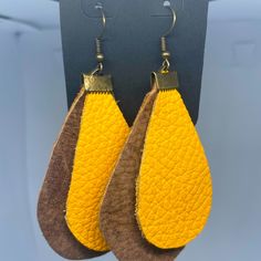 Leather Earrings In Brown And Yellow Trendy Yellow Earrings With Ear Wire, Trendy Yellow Earrings For Everyday, Trendy Yellow Everyday Earrings, Casual Yellow Drop Earrings, Everyday Yellow Earrings With Ear Wire, Yellow Earrings With Ear Wire For Everyday, Yellow Teardrop Earrings, Yellow Teardrop Earrings For Everyday, Yellow Teardrop Dangle Earrings