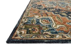 an area rug with various colors and designs