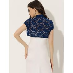 An elegant stand collar and short sleeves make this beautiful lace cardigan a great outfit for any occasion. This lace bolero is perfect for a wedding dress. Team it with a sleeveless dress and a mini bag to complete the elegant look. Lend an understated detail to your formal ensemble with this cropped bolero. This shrug can be paired with many suspender dresses to perfect your outfit. Elegant Short Sleeve Scalloped Lace Top, Elegant Blue Lace Top, Elegant Blue Lace Top With Lace Trim, Elegant Short Sleeve Lace Top For Party, Short Sleeve Bolero, Cropped Shrug, Lace Shrug, Lace Bolero, Lace Cardigan