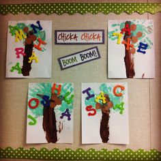 four children's handprints on paper with letters and numbers in the shape of a tree