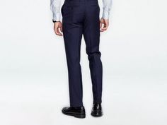 Classic, versatile and reliable - the Hemsworth is your tried-and-true navy suit. This solid-colored number in pure premium wool stands up to whatever the daily hustle throws at you. Navy Fitted Dress Pants For Business Casual, Fitted Navy Dress Pants For Business Casual, Navy Fitted Dress Pants For Work, Elegant Fitted Navy Dress Pants, Elegant Tailored Navy Dress Pants, Navy Fitted Suit For Office Wear, Navy Fitted Three-piece Suit For Office, Fitted Navy Three-piece Suit For Office, Tailored Navy Suits For Office