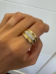 Chunky Gold Vintage ring, 0.2CT Round Natural Diamond, 18k Yellow Gold, Gold Vintage Jewelry,thick band, chunky ring, estate ring, tank ring Jewelry Material: Yellow + White Gold 18k (the gold has been tested by a professional) Total Carat Weight: 0.20ct (Approx.) Total Metal Weight: 9.40g Size: 8 US Grading Results: Stone Type: Diamond Shape: Round Carat: 0.20ct (Approx.), Stones quantity:16 Color: F Clarity: SI1 So who is Nola? Nola is our creation and imagination. All the idea of Nola is to b Chunky Gold Engagement Ring, Chunky Engagement Rings, Chunky Gold Rings, Tank Ring, Gold Vintage Jewelry, Gold Vintage Ring, Estate Ring, Thick Ring, Estate Rings