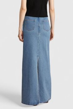 This Maxi Denim Skirt is crafted with a cropped waistband for a fashionable edge, and featuring pockets, a zipper closure, and a straight fit.Fabric: Cotton, Polyester Maxi Denim Skirt, Long Jean Skirt, Denim Maxi Skirt, Blue Maxi, Swimwear Cover Ups, Swimwear Cover, Jean Skirt, Swimwear Tops, Fabric Cotton