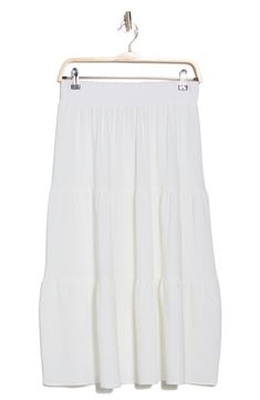 When the sun is shining, there's nothing better than a lightweight and flowy midi skirt crafted in a tiered silhouette. 31" length (size Small) Elastic waist 98% polyester, 2% spandex Machine wash, line dry Made in the USA Chic Tiered Maxi Skirt For Summer, Summer Tiered Maxi Skirt For Brunch, Casual Tiered Maxi Skirt For Brunch, Chic Tiered Voluminous Maxi Skirt, Day Out Tiered Maxi Skirt, Chic Relaxed Tiered Skirt, Flowy Tiered Maxi Skirt For Brunch, Relaxed Tiered Skirt With Elastic Waistband, Summer Brunch Maxi Tiered Skirt