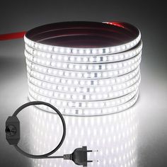 a close up of a light strip on a table with a cord attached to it