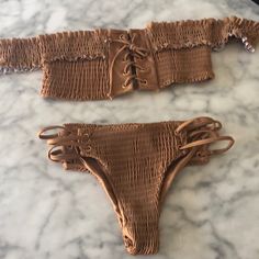 Brand New Bikini Set With Protective Liner. Ships Out Same Day Of Purchase Or Next Morning. Wearing Size Small In Pics. Fabric: Polyester & Acrylic Bikini Style: Wire Free, Padded, Elastic Waist Sizing: Small- 24.41~25.98" Medium- 25.98~26.56" Large- 26.56~29.13" Bust Sizing: Small- 31.50~33.86" Medium- 33.86~36.22" Large- 36.22~38.58" Small Size 2-4, Medium Size 46, Large Size 6-8 Brown Swimwear For Spring Beach Party, Off-shoulder Stretch Swimwear For Beach Season, Fitted Off-shoulder Swimwear For Vacation, Stretch Off-shoulder Swimwear For Beach Season, Brown Strapless Swimwear For Summer, Strapless Brown Swimwear For Summer, Chic Off-shoulder Swimwear For Beach, Brown Bandeau Swimwear For Summer, Summer Stretch Off-shoulder Swimwear