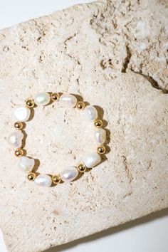 PG Designs Pearl Design with Gold Bead Bracelet Color: Pearl Design/Gold Stretch Bracelet Can get wet Avoid chlorine and perfumes Gold Bead Bracelet, Gold Stretch Bracelet, Bracelet Pearl, Gold Bead Bracelets, Pearl Design, Beaded Stretch Bracelet, Bead Bracelet, Stretch Bracelet, Gold Beads