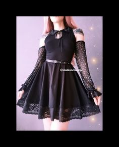 "✨Dress   in elastic cotton with stars sleeves and neck, lace on hemline and semi skater dress. Black fabric : cotton 97%- elastane 3% / Stars fabric : 100% polyester. Includes the waist belt in faux leather.  Size XS: chest 84cm/33\" --- waist 58cm/22,6\" --- length  85cm/33,4\"  Size S: chest 88cm/35\"    --- waist  64cm/25,1\" ---length   85cm/33,4\"  Size M: chest 96cm/38\"  ---  waist 72cm/28,3\" --- length  90cm/ 35,4\" Size L: chest 106cm/41\"   ---  waist 82cm/32,2\"  ---length  97cm/38, Emo Mini Dress For Alternative Fashion, Black Mini Length Emo Dress, Punk Style Mini Evening Dresses, Black Emo Mini Dress, Black Emo Dress For Night Out, Emo Mini Dress For Halloween Night Out, Halloween Lace Dresses For Alternative Fashion, Emo Fitted Long Sleeve Dress, Fitted Emo Dress For Night Out