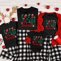 Welcome to our 2023 family's Christmas celebration! Make this holiday season extra special with our matching Christmas shirts for Mom, Dad, Youth, and your adorable newborn. Our collection includes Bella Canvas 3001 for adults, 3001Y for youth and Rabbit Skins short sleeve for the little ones. Why Choose Our Christmas Matching Shirts? - Family Bonding: Share laughter and create lasting memories by wearing matching outfits that express your love for family. - High-Quality Material: Our Bella Canv Family Matching Holiday T-shirt With Letter Print, Family Matching Letter Print Holiday Tops, Family Matching Holiday Tops With Letter Print, Black Holiday Tops For New Year, Holiday Family Letter Print Tops, Letter Print Tops For Family Holiday, Holiday Tops With Letter Print, Family Christmas Tops With Graphic Print, Family Matching Holiday Crew Neck Tops