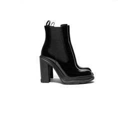 Black Shine Brush-Off Leather Chelsea Boot With A Thick Rubber Tread Sole And Stacked Heel. The Boot Features Tonal Elastic Side Panels. Boot Silhouette With A Round Toe Shape. Finished With An Alexander Mcqueen Signature On The Sole. Material: 100% Calf Leather Made In Italy. Sku: 678530whz84-1000 Black Platform Boots With Leather Sole, Black Platform Boots With Almond Toe And Padded Heel, Elegant Black Platform Boots With Leather Sole, Black Almond Toe Platform Boots With Reinforced Heel, Black Block Heel Heels With Lug Sole, Black High Heel Platform Boots With Rubber Cap, Black Closed Toe Heels With Lug Sole, Elegant Patent Leather Platform Boots With High Heel, Elegant Patent Leather High Heel Platform Boots