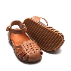 ***Looking for a smaller size? Click HERE to see this same style with smaller sizes in a soft sole.*** Elevate your summer footwear with our Camel Woven Sandals, available in US sizes 5-10. These versatile sandals are the perfect accessory, effortlessly transitioning from casual to dressy occasions. Designed with genuine leather and a sturdy hard sole, they provide the ideal combination of style, comfort, and durability. Key Features: Stylish Design: The intricate woven pattern and camel color m Slip-on Round Toe Sandals For Beach, Summer Slip-on Sandals With Textured Sole, Comfortable Slip-on Sandals With Textured Sole, Slip-on Open Toe Sandals With Stitched Sole, Brown Open Toe Flats With Rubber Sole, Brown Slip-on T-strap Sandals For Summer, Brown T-strap Sandals With Ankle Strap And Rubber Sole, Brown Ankle Strap T-strap Sandals With Rubber Sole, Closed Toe Brown T-strap Sandals For Spring