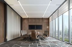 an empty conference room with chairs and tables in front of large glass windows that overlook the city