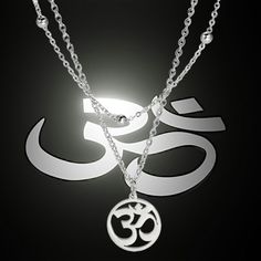 Om or Aum is a sacred sound and a spiritual symbol in Indian religions. It signifies the essence of the ultimate reality, consciousness, or Atman. More broadly, it is known as a syllable, which is chanted either independently or before a spiritual recitation in Hinduism, Buddhism, and Jainism. This beautiful double-chain layered om necklace is made of solid hypoallergenic 316L surgical stainless steel. The aum wrap necklace has a high polish finish. The first cable chain approximately measures 1 Om Necklace, Spiritual Symbols, Wrap Necklace, Wrap Necklaces, Double Chain, Cable Chain, Buddhism, Consciousness, Essence