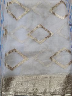 More wedding dupatta and accessories here in our collection https://www.etsy.com/in-en/shop/KabiraCreations?ref=related&listing_id=1077422871#items A beautiful white soft organza dupatta with intricate Banarasi work.  Choose from our range of exquisitely designed and curated dupattas, each piece is designed to perfection with intricate detailing that lends an aura of grandeur to your outfits. Specification Material- Soft Organza Banarasi  Length- 2.25 meters All over Banarasi motifs  * Note: our Chanderi Traditional Wear With Gota Work For Eid, Wedding Jamawar Dupatta With Zari Work, Wedding Traditional Wear With Jamawar Dupatta, Bollywood Tissue Silk Kurta For Wedding, Festive Gold Jamawar Lehenga, Bollywood Style Wedding Tissue Silk Kurta, Bollywood Style Tissue Silk Kurta For Weddings, Wedding Kurta In Tissue Silk For Eid, Bollywood Wedding Kurta In Tissue Silk