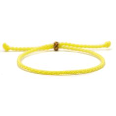 Embrace minimalist style with our Unisex Waterproof Buddhist Braided Bracelet. Handmade with Buddhist braiding techniques, this durable accessory comes in various sizes to suit men and women. Perfect for active lifestyles, its versatility and waterproof design make it an ideal surfer bracelet for all KNOTS : Each knot is meticulously tied, resulting in a stunning pattern that symbolizes the interconnectedness of life. The intricate knots create a mesmerizing visual spectacle, capturing the atten Yellow Braided Friendship Bracelets, Casual Yellow Friendship Bracelets, Minimalist Beach Bracelet With Adjustable Cord, Minimalist Adjustable Cord Bracelets For Beach, Minimalist Adjustable Cord Bracelet For Beach, Beach Jewelry With Braided Nylon Cord, Minimalist Braided Bracelets For Beach, Minimalist Braided Bracelets With Sliding Knot For Beach, Minimalist Braided Bracelet For Everyday Use