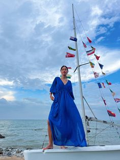 Discover the beauty of our Andaman Kaftan in Royal Blue, a versatile piece designed for your next escape. With inspiration from the vibrant ocean and sky, this oversized kaftan dress brings together elements of comfort, elegance, and timeless style. Whether worn as a maxi dress, beach cover-up, or wrap kimono dress, it effortlessly adds vacation vibes to any outfit. Made from modal viscose and ethically sourced, it not only elevates your style, but also represents a conscious choice. Complement Blue Breezy Flowy Cover-up, Blue Flowy Breezy Cover-up, Blue Flowy Cover-up For Beach Season, Flowy Blue Beach Dress For Beach Season, Flowy Blue Maxi Beach Dress, Royal Blue Summer Beach Dress, Blue Long Sleeve Maxi Dress For Beach Season, Blue V-neck Maxi Dress For Beach Party, Blue Oversized Summer Dress