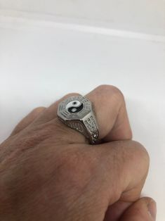 Cool Vintage Rock and Roll star men's ring Nice heavy ring, Stainless Steel Unused stock from the 1980's I have an assortment of sizes from 7 to 13 Please add your size to the order in a message and I will send the size you require. If I am out of stock in your size, I will list the ones I have available for replacement. If I am sold out in the sizes you would prefer, I will cancel and refund you, Thank you All jewelry is shipped in a nice gift box. Check out our over a THOUSAND great reviews En Vintage Rock, Ying Yang, Enamel Ring, Men's Ring, Yin Yang, Martial Arts, Vintage Rings, Class Ring, Statement Rings