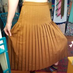 Wow. This Is Just...Wow. Original Nwt Lilli Ann Collections Highwaisted Pleated 70s Does 50s Mocha Colored Skirt. Backside Has Elastic At Waist. Hidden Zipper And Side Button. Has Some Slight Discoloration On Top Left Waist Area. Not Sure What? Might Just Need A Cleaning. Other Than That, Crazy Good Condition! No Pockets. Feels Like A Poly Blend. 15in Waist And 30in Length. Best Fit A L/Xl. Pls Ask Any Questions! High-waist Fitted Brown Pleated Skirt, Brown Fitted High-waist Pleated Skirt, Brown Fitted High Waist Pleated Skirt, Casual Fitted Full-length Pleated Skirt, Brown Full-length Skirt For Spring, Spring Full Length Brown Skirt, Brown Full Length Skirt For Spring, Fitted Long Skirt With Accordion Pleats, Brown Fitted Full Length Skirt