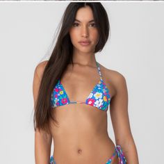 Spring Swimwear For Poolside: Tie-side Bottom, Spring Tie-side Bottom Swimwear For Poolside, Spring Tropical Swimwear With Triangle Top, Tropical Triangle Top Swimwear For Spring, Spring Beach Triangle Top Swimwear, Spring Triangle Top Swimwear For Beach, Spring Triangle Top Swimwear For Sunbathing, Spring Tropical Print Swimwear With Tie-side Bottom, Floral Print Tie-side Swimwear For Poolside