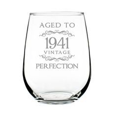 a wine glass that says aged to 1934 vintage perfection