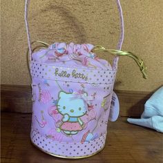 Pink Drawstring Hello Kitty Fairy Basket Bag Made From A Water Resistant Material Can Be Used For Toiletries Or Even At The Beach Never Been Used, Still Has Tag On It Has One Minor Flaw At Bottom Of Bag. Shown In Last Picture. Was Purchased This Way. Open To Offers! Cute Hello Kitty Shoulder Bag For Gift, Cute Hello Kitty Shoulder Bag As Gift, Cute Pink Bucket Bag, Cute Pouch Bucket Bag For Daily Use, Pink Bucket Bag With Removable Pouch As Gift, Cute Daily Use Pouch Bucket Bag, Cute Bucket Bag For Daily Use, Fairy Basket, Hello Kitty Fairy