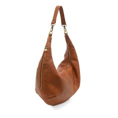 This relaxed and slouchy crescent shape hobo crafted in tumbled vegan leather is on trend and so easy to wear with 2 versatile straps, one short and one adjustable long so you can wear as a short shoulder or a crossbody. 8 in. H x 18 in. W x 5.5 in. D Top zip closure Removable short shoulder strap: 14 in. drop Adjustable and removable crossbody shoulder strap: 22 in.- 32 in. drop Brass plated hardware Logo zip pull 100% Vegan leather (polyurethane) Floral fabric lining One interior zip closure p Fall Hobo Bag With Adjustable Strap For On-the-go, Faux Leather Hobo Bag With Adjustable Strap For On-the-go, Trendy Hobo Bag For On-the-go, Versatile Faux Leather Hobo Bag Crossbody, Versatile Faux Leather Crossbody Hobo Bag, Versatile Crossbody Hobo Bag With Single Strap, Versatile Textured Leather Hobo Bag For On-the-go, Trendy Everyday Hobo Bag With Single Shoulder Strap, Trendy Hobo Bag With Single Shoulder Strap For Everyday