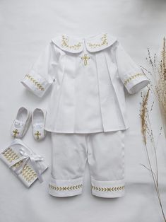 "Lovely Baptism outfit set for a Baby Boy made from soft pure polished cotton.  It looks nice and glitters elegantly. Christening Outfit Set, color white, decorated with gold embroidery.  Embroidery of Cross or JHS, as well as a kind of Cross, could be changed upon request.  The thread color of the embroidery could be: gold, silver, white, ivory, blue Booties, hat, blanket, hair bag, bib could be included in the SET option.  Personalization is available on each item.  If the christening will tak White Cotton Baptism Sets, Fitted Embroidered Sets For Baptism, White Cotton Sets For Baptism, Elegant Embroidered Baptism Sets, Cotton Baptism Sets, Embroidered Cotton Baptism Dress, White Embroidered Baptism Sets, White Embroidered Sets For Baptism, Embroidered Cotton Sets For Baptism