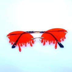 Tear Drop Sunglasses. Red With Drip Design And Rhinestones. Bundle Any 3 Glasses For $25 Plus Free Shipping Red Rimless Sunglasses For Party, Red Rimless Sunglasses For Summer, Trendy Red Rimless Sunglasses, Red Y2k Glasses, Gigi Hadid Sunglasses, Red Flame Sunglasses, Drip Sunglasses, Retro Red Sunglasses With Gradient Lenses, Fun Red Heart-shaped Sunglasses