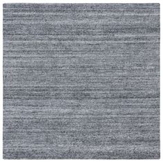 a gray rug with horizontal stripes