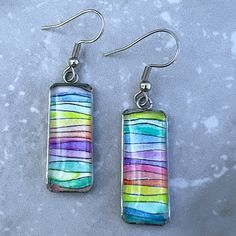 Rectangular hand-painted rainbow watercolor earrings. Watercolor Resin Jewelry, Watercolor Earrings, Watercolor Jewelry, Alcohol Ink Jewelry, Resin And Wood Diy, Washer Jewelry, Epoxy Projects, Clay Arts, Polymer Clay Jewelry Tutorials