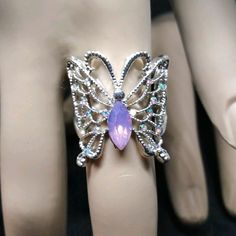 Stunning! Brand New W/O Tags..Sterling Silver Size 7 Butterfly Ring With A Beautiful Purple Main Stone With Small Yet, Very Bright Shiny Stones On The Wings Silver Butterfly Ring For Parties, Silver Crystal Ring With Bling For Parties, Silver Metal Crystal Ring For Party, Adjustable Silver Crystal Ring For Party, Silver Butterfly Jewelry For Wedding, Handmade Silver Adjustable Butterfly Ring, Silver Butterfly Sterling Silver Jewelry, Nickel-free Butterfly Jewelry For Party, Sterling Silver Party Rings With Bling