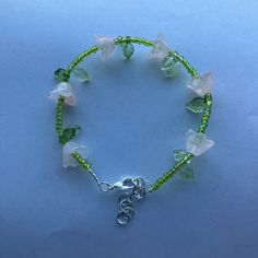 Pink Lily of the Valley Beads with Green leaf and Seed Beads Green Beaded Flower Crystal Bracelet, Pink Lily Of The Valley, Lily Bracelet, Bff Bracelets, Pink Lily, Green Leaf, Lily Of The Valley, The Valley, Seed Beads