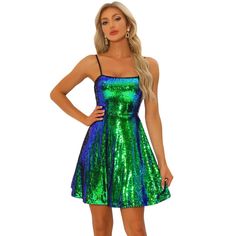 This dress is the epitome of casual-cool attraction with its sleeveless design and two-color sequins that make you stand out at any nightclub. The adjustable spaghetti straps and fit flare design give you the perfect fit, making it an excellent choice for any party, club, or night out. You'll feel confident and noticeable enough in this stylish dress that's sure to turn heads. Get ready to make a statement with the Sequin Backless Spaghetti Strap Club Above Knee Mini Party Dress! Sleeveless Sequin Dress For Costume Party, Sequined Sleeveless Mini Dress For Costume Party, Sleeveless Sequin Dress For Holiday Costume Party, Sleeveless Sequin Holiday Dress For Costume Party, Holiday Sleeveless Sequin Dress For Costume Party, Holiday Sequin Sleeveless Dress For Costume Party, Sleeveless Disco Sequin Dress For Spring, Sleeveless Sequin Disco Dress For Spring, Summer Dresses With Contrast Sequin And Spaghetti Straps