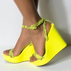 Handcrafted US sizing. Fits true to size. Heel Height: 5.5" / 140 mm approx Product measurements were taken using size 8. Please note that measurements may vary by size. Yellow Wedge Sandals With Ankle Strap, Yellow Ankle Strap Wedge Sandals, Yellow Round Toe Wedge Sandals For Party, Yellow Synthetic Wedge Sandals With Ankle Strap, Yellow Open Toe Wedge Sandals For Party, Yellow Synthetic Ankle Strap Wedge Sandals, Yellow Wedges, Yellow Heels, Snakeskin Heels