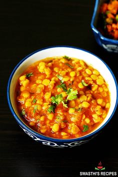 a bowl of chana dal is sitting on a table