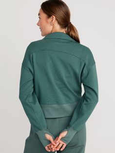 Featuring Dynamic Fleece: soft, sleek fleece with stretch.  Drawstring funnel neck, with half-zip front.  Long sleeves, with rib-knit cuffs.  Vertical zip pockets.  Four-way super stretch.  Pullover style.  #799503 Loose fit.  Women's sweatshirt hits Versatile Funnel Neck Top With Ribbed Cuffs, Athleisure High Neck Tops With Ribbed Cuffs, Fall Athleisure Track Jacket For Loungewear, Long Sleeve Sweatshirt With Thumbholes For Fall, Funnel Neck Sweatshirt With Pockets For Loungewear, Trendy Long Sleeve Track Jacket With Ribbed Cuffs, Versatile Half-zip Fall Tops, Versatile Half-zip Tops For Fall, Athleisure Turtleneck Top With Ribbed Cuffs