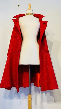 "1960's Vintage Couture Red Brocade Jacket Beautifully made.  Superb craftmanship \"Gordi Fashions, Montreal\" is what reads on the label.  The cut is just gorgeous.  It has an awesome flare that looks like a playful skirt.  Awesome! Dimensions: Size:  Small Shoulder to shoulder: 40 cm Underarm to underarm:  47 cm Length from neck to bottom: 96cm We bought this gorgeous jacket from the daughter of a Canadian textile tycoon in Montréal, Canada.  She told me that this was her favorite jacket and brought her many beautiful memories just looking at it!  I bought several dresses from her but chose only this one coat for you!" Fitted A-line Party Outerwear, Fitted Cape-style Party Outerwear, Fitted Party Cape Outerwear, Fitted Cape Outerwear For Party, Fitted Vintage Red Outerwear, Vintage Red Outerwear For Evening, Red Fitted Outerwear For Evening, Vintage Fitted Cape Outerwear, Brocade Coat