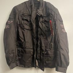 This Jacket Is Brand New. It Was Never Worn. This Jacket Is Just Laying Around In The Closet. The Material Inside Neck Of This Jacket Has Some Imperfections. Look At The Pics. Some Of The Material Is Rubbing Off. This Is Probably Caused From The Hot Storage Room. This Doesn’t Take Anything Away From The Function Of The Jacket Black Casual Outerwear For Motorcycling, Casual Black Outerwear For Motorcycling, Moto Biker Jacket With Long Sleeves For Outdoor, Moto Style Long Sleeve Outdoor Outerwear, Winter Biker Jacket With Pockets For Motorcycling, Long Sleeve Moto Outerwear For Outdoor, Winter Motorcycling Biker Jacket With Pockets, Casual Winter Outerwear For Motorcycling, Winter Long Sleeve Motorcycle Outerwear