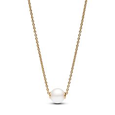 Elevate your style with our Treated Freshwater Cultured Pearl Collier Necklace from our Pandora Timeless collection. This 14k gold-plated piece features an adjustable cable chain with a luminous treated freshwater cultured pearl pendant. A clear cubic zirconia by the clasp adds a touch of sparkle. This necklace represents the fusion of classic and contemporary, making it a perfect choice for both casual and special occasions. Please note that each treated freshwater cultured pearl is unique and can vary in size and colour; normal wear and tear may occur with this material. Our freshwater cultured pearls are treated with bleaching and lustre enhancement. Pandora Pearl, Engagement Rings Bridal Sets, Engagement Ring Guide, Bridal Ring Sets, Freshwater Cultured Pearls, Anniversary Bands, Metal Necklaces, Pandora Jewelry, Perfect Gift For Her