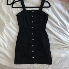 Adorable Black Mini Dress With Metal Buttons Down The Middle. Denim-Like Material And Has Pockets! Never Been Worn / Still Has Tags. Black Cotton Denim Dress For Spring, Black Denim Mini Dress For Night Out, Trendy Black Denim Mini Dress, Casual Black Denim Mini Dress, Casual Black Denim Cotton Dress, Black Cotton Denim Dress For Night Out, Black Buttoned Summer Denim Dress, Black Buttoned Denim Dress For Summer, Casual Black Denim Dress For Summer